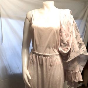 A sample, never worn. Petal Pink with shimmer. Worn out or as lingerie